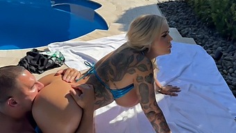 Pretty Blonde Gets A Creamy Facial And A Tattooed Ass In A Poolside Scene.
