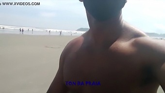 A Lot Of Guys On A Beach Stroll In The Morning
